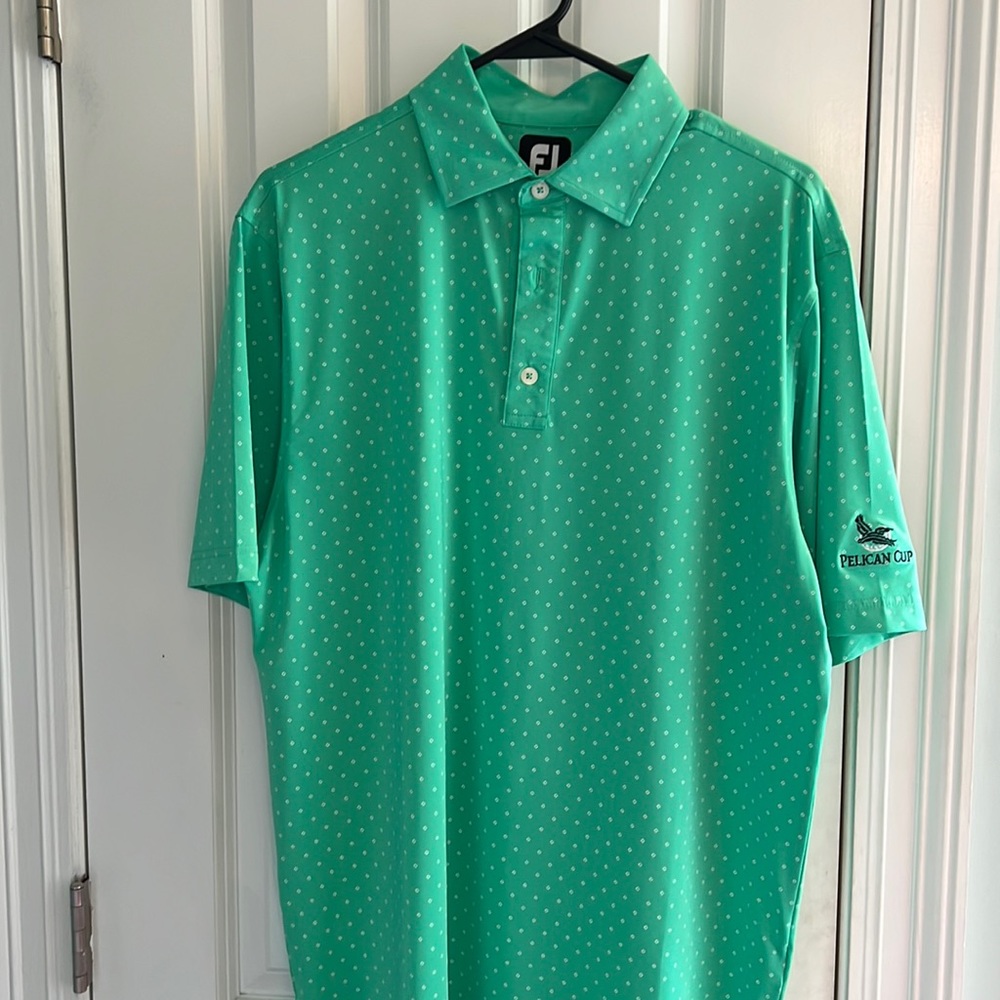 Medium bright green FootJoy golf shirt.